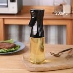 Oliefles - 200ML - Olie Spray - Olie Spuit - Keuken & Koken - Huishouden - Spray voor Olijfolie of Zonnebloem Olie - Keuken Accessoires - Luxe Oliespuit - Hoge Kwaliteit - Inhoud: 200ml - Kitchen - Keuken Musthaves - Oliespray / Olie Spuitfles