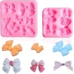 Allecto Plus - Set van 2 roze siliconen vlinder vormen voor fondant en chocolade - hittebestendig - veelzijdig voor taart- en feestontwerpen - keuken accessoire.